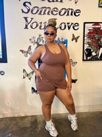 Load image into Gallery viewer, A woman wearing a brown active romper dress with shorts underneath 
